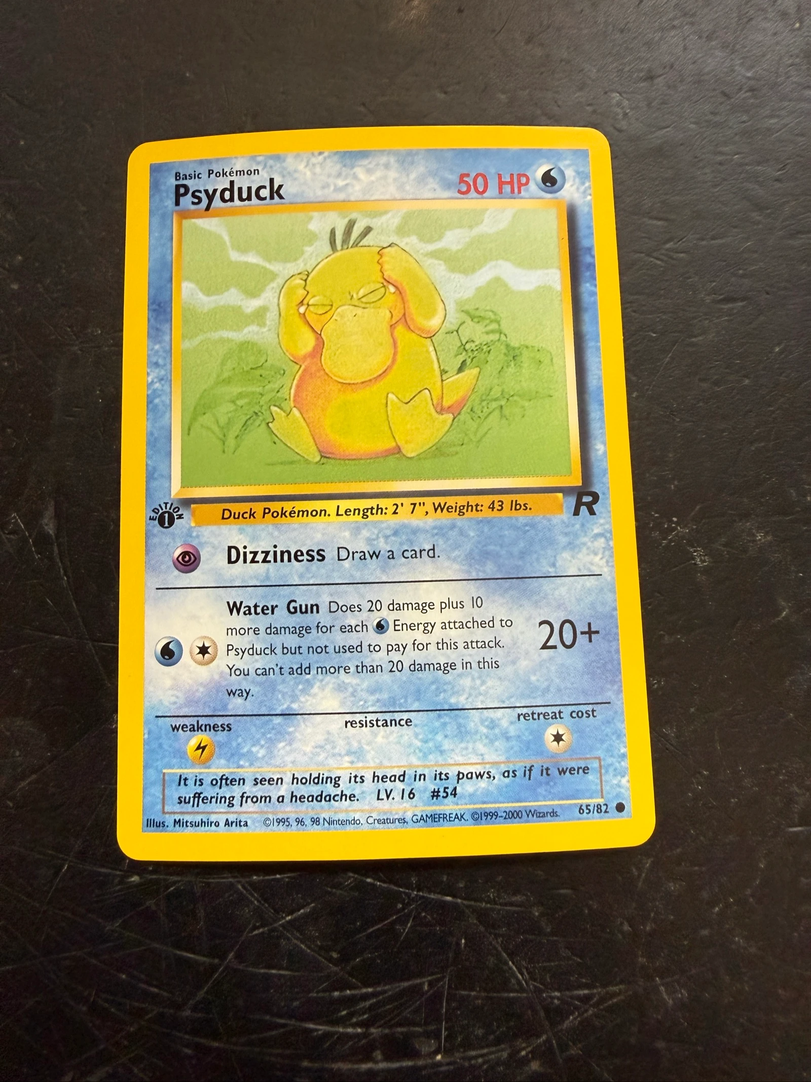 Carta Pokemon psyduck Rocket First Edition 